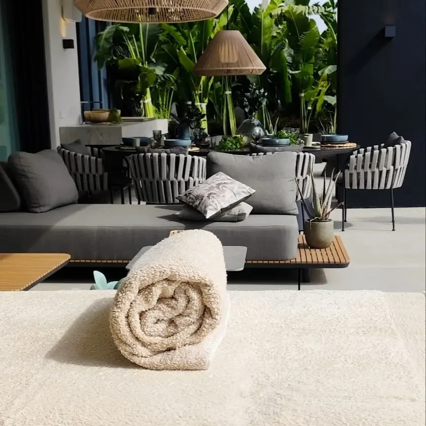 Towel rolled up on a massage table in a villa in Marbella